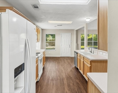 7015 Atasca Creek Drive - Photo Thumbnail 2