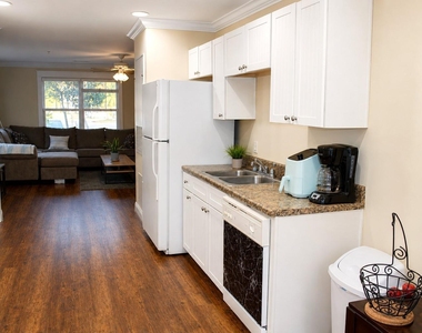1725 Harvey Mitchell Parkway S - Photo Thumbnail 5