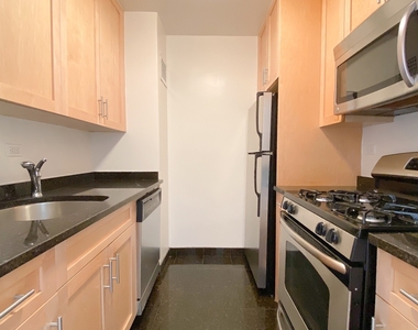 East 49 Street - Photo Thumbnail 2
