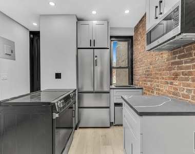 W 52nd St. - Photo Thumbnail 1