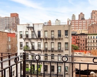 West 53 Street - Photo Thumbnail 3