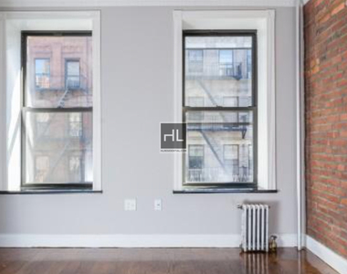 W 103rd St. - Photo Thumbnail 3