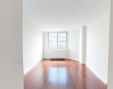 401 E 34th St - Photo Thumbnail 3