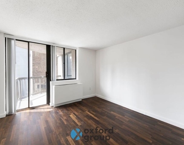 E 33rd St. - Photo Thumbnail 1