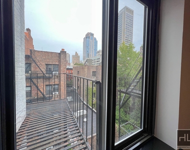 East 80 Street - Photo Thumbnail 1