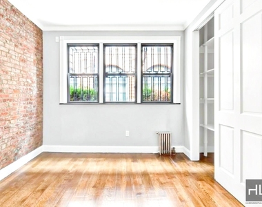 E 26th St. - Photo Thumbnail 3