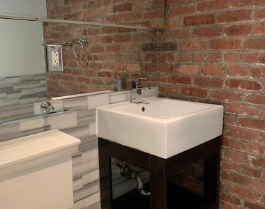 E 26th St. - Photo Thumbnail 7