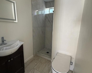 1207 E 8th - Photo Thumbnail 6