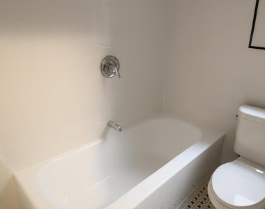 117 W 13th St - Photo Thumbnail 2
