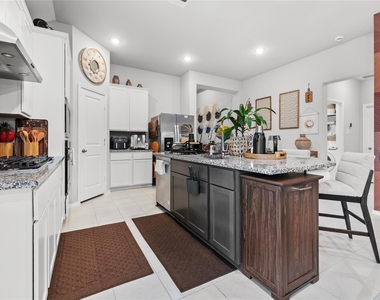 8727 Gleaming Village Way - Photo Thumbnail 8