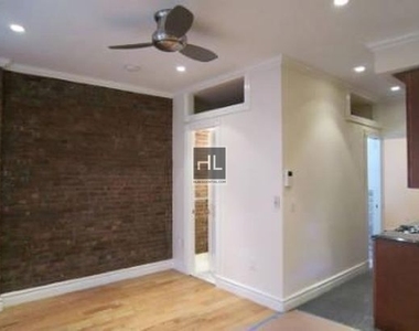 W 103rd St. - Photo Thumbnail 1