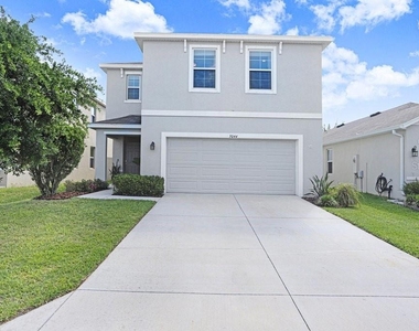 3044 Suncoast Plains Drive - Photo Thumbnail 1