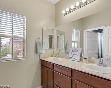 9122 Island Wolf Avenue - Photo Thumbnail 4