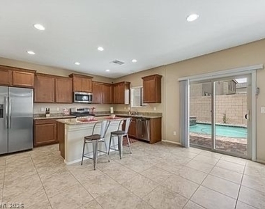 9122 Island Wolf Avenue - Photo Thumbnail 18