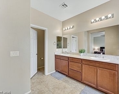 9122 Island Wolf Avenue - Photo Thumbnail 12