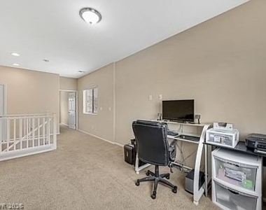 9122 Island Wolf Avenue - Photo Thumbnail 5
