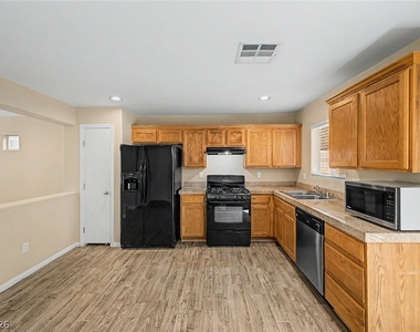 6077 Aripeka Street - Photo Thumbnail 6