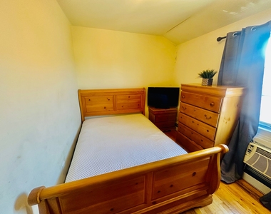 1033 East 58th Street - Photo Thumbnail 4