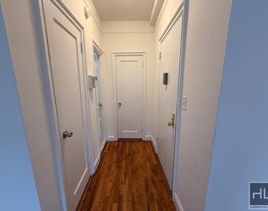 E 58th St - Photo Thumbnail 2
