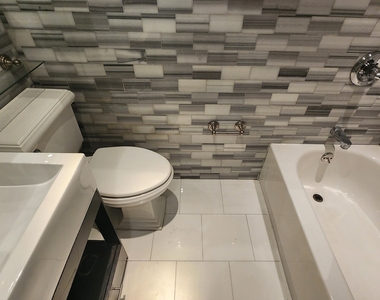 West 53 Street - Photo Thumbnail 5