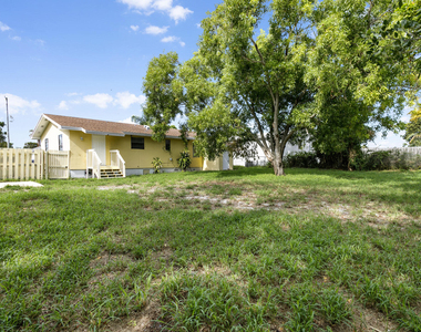 1464 W 32nd Street - Photo Thumbnail 1