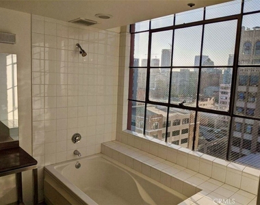 315 E 8th Street - Photo Thumbnail 5
