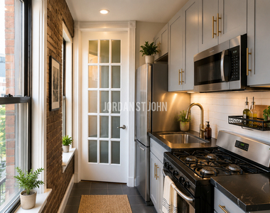 E 13TH ST - Photo Thumbnail 4