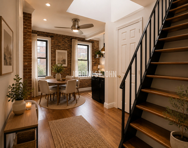 E 13TH ST - Photo Thumbnail 1