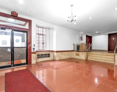 43-33 48 Street - Photo Thumbnail 3
