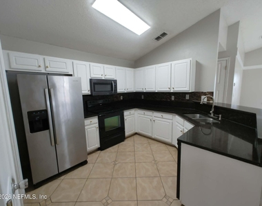 7548 Cliff Cottage Drive - Photo Thumbnail 3