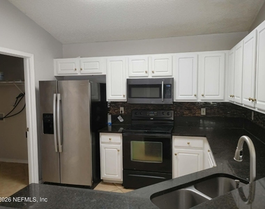 7548 Cliff Cottage Drive - Photo Thumbnail 2