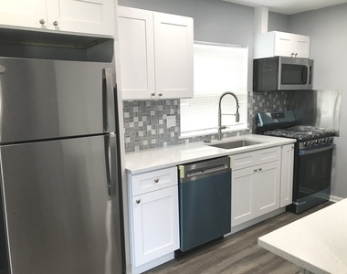 7646 W 63rd Place - Photo Thumbnail 1