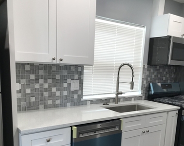 7646 W 63rd Place - Photo Thumbnail 3