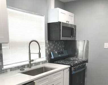 7646 W 63rd Place - Photo Thumbnail 2