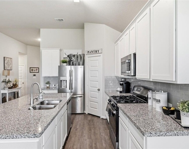 14815 Rain Tree Drive - Photo Thumbnail 3
