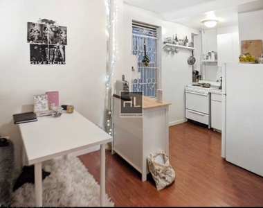 East 11th Street - Photo Thumbnail 1
