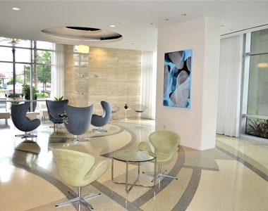 150 E Robinson Street - Photo Thumbnail 2