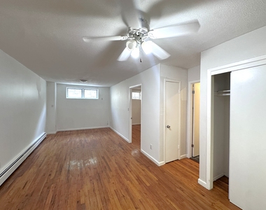 65-12 Maurice Avenue - Photo Thumbnail 3