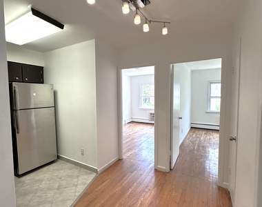 65-12 Maurice Avenue - Photo Thumbnail 1