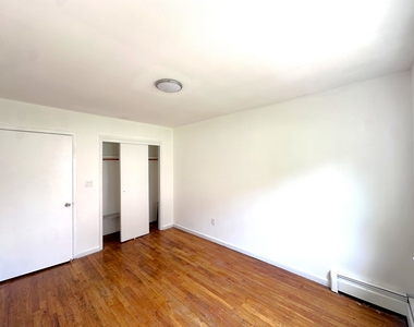 65-12 Maurice Avenue - Photo Thumbnail 3