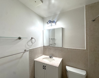 65-12 Maurice Avenue - Photo Thumbnail 4
