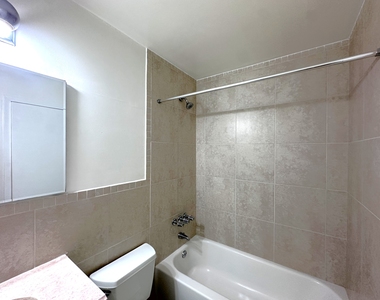 65-12 Maurice Avenue - Photo Thumbnail 5