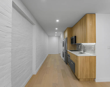 243 East 31st Street - Photo Thumbnail 2