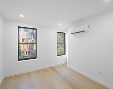 243 East 31st Street - Photo Thumbnail 4