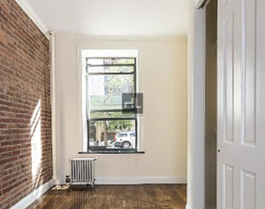 W 103rd St. - Photo Thumbnail 1