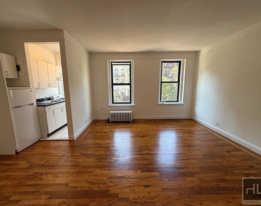 E 58th St - Photo Thumbnail 3