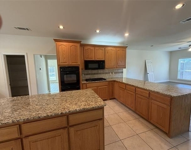 1001 Meadow Creek Drive - Photo Thumbnail 5