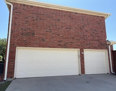 1001 Meadow Creek Drive - Photo Thumbnail 1