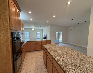 1001 Meadow Creek Drive - Photo Thumbnail 6