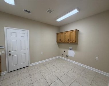 1001 Meadow Creek Drive - Photo Thumbnail 8